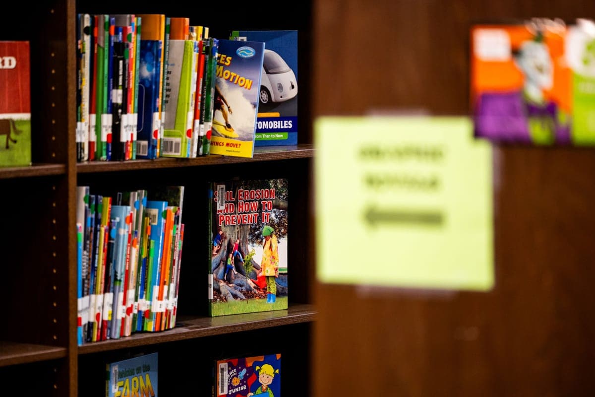 A shelf of colorful books about nature