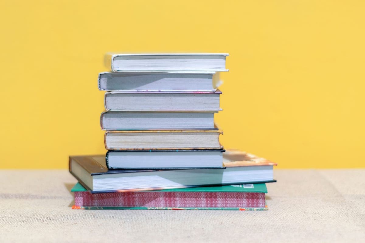 A stack of books against a bright background